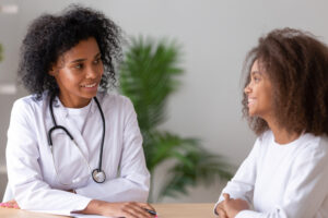 Endocrinologist consulting with patient