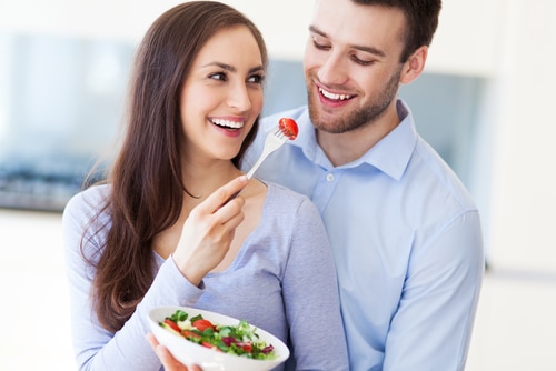 Couple eating salad