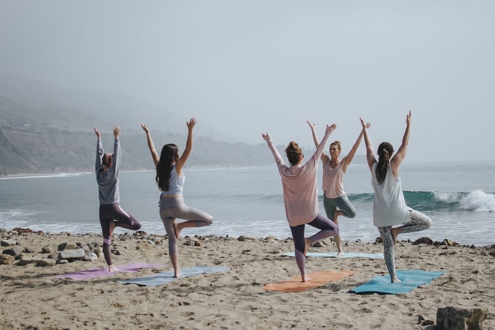 Support group doing yoga after treamment for PCOS